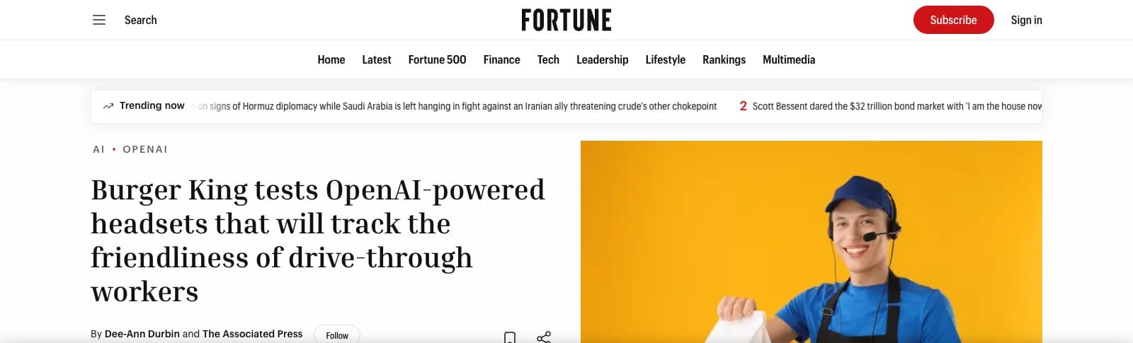 Article de Fortune : Burger King tests OpenAI-powered headsets that will track the friendliness of drive-through workers, avec la photo d'un équipier portant l'oreillette